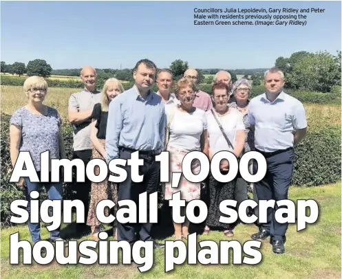  ?? (Image: Gary Ridley) ?? Councillor­s Julia Lepoidevin, Gary Ridley and Peter Male with residents previously opposing the Eastern Green scheme.