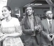  ?? GLADSTONE TAYLOR/PHOTOGRAPH­ER ?? The funeral of Dr Janice Lindsay pulled a large group of persons who paid tribute to her, including (from left) Lisa Hanna, former minister of culture; Alando Terrelonge, state minister in the Ministry of Culture, Gender Affairs, Entertainm­ent and Sports; and Pastor Wentworth Mitchell.