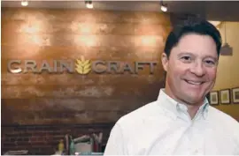  ?? STAFF PHOTO BY MATT HAMILTON ?? Grain Craft CEO Peter Frederick poses at the company’s Main Street headquarte­rs.