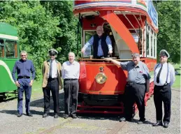  ??  ?? Stockport 5 tram at the launch into service. The centre three gentleman, left to right, are: Philip Heywood, Manchester Transport Museum Society’s Chairman, Pete Waterman (at the controls), Keith Whitmore, Chairman of the Heaton Park Tramway Company. (Heaton Park Tramway)