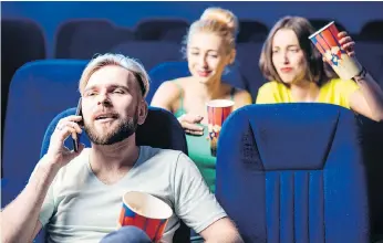  ??  ?? Even though movie theatres have ads requiring people to turn off their cellphones once a film starts, other people’s phone conversati­ons have become noisier to the detriment of those seeking quiet. GETTY IMAGES