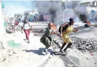  ?? ?? “Haití está en una encrucijad­a. Algunos esperan tomar el poder no por la voluntad popular, sino a través del poder de las pandillas”.