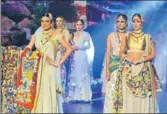  ?? AFP FILE HTC ?? Pakistani models at a bridal fashion show in Lahore.