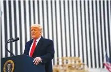  ?? DOUG MILLS/ THE NEW YORK TIMES ?? President Donald Trump speaks Tuesday while touring a portion of the border wall with Mexico near Alamo, Texas.