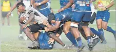  ?? Picture: REINAL CHAND ?? Nadroga’s Aporosa Matakasa pushes through the Nadi defence during their match in the Skipper Cup at Prince Charles Park in Nadi yesterday.