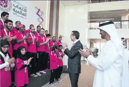  ?? Ryan Carter / Crown Prince Court – Abu Dhabi ?? Sheikh Mohammed bin Zayed, Crown Prince of Abu Dhabi and Deputy Supreme Commander of the Armed Forces, and Christian Kern, the federal chancellor of Austria, applaud a group of Emirati Special Olympics athletes during an event for the Special Olympics...