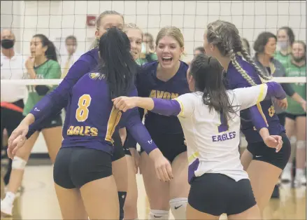  ?? JENNIFER FORBUS — FOR THE MORNING JOURNAL ?? Avon celebrates a point during the third set Oct. 27against Medina Highland.