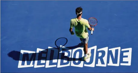  ?? ANDY BROWNBILL / AP 2015 ?? Entering the Australian Open, Roger Federer (above) holds the men’s record for most Grand Slam singles titles with 20. He is followed by Rafael Nadal with 19 and Novak Djokovic with 16. Federer’s most recent Grand Slam title was at Melbourne Park in 2018.