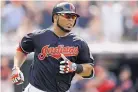  ?? TONY DEJAK/ASSOCIATED PRESS ?? Cleveland’s Edwin Encarnacio­n rounds the bases after hitting one of his three home runs Wednesday.