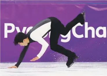  ?? THE ASSOCIATED PRESS ?? Nathan Chen of the United States falls while performing in the men’s free figure skating final in the Gangneung Ice Arena at the 2018 Winter Olympics in Gangneung, South Korea.