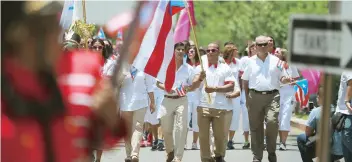  ??  ?? Desfile de parte de la delegación de Puerto Rico que partió a las Olimpiadas 2016 en Brasil.