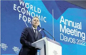  ?? Picture: ARND WIEGMANN/REUTERS ?? SERIOUS BUSINESS: Swiss President Ignazio Cassis addresses delegates during the opening ceremony of the World Economic Forum’s annual meeting in Davos