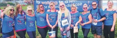  ??  ?? Members from the MND Associatio­n East Kent raised money by completing a coastal walk