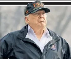  ??  ?? ON PATROL: President Trump on Saturday eyes the California town of Paradise, which has been decimated by wildfires.