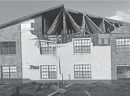  ?? REBECCA SANTANA/AP ?? An apartment building in Houma, Louisiana, was damaged extensivel­y enough by Hurricane Ida that residents have to move out.