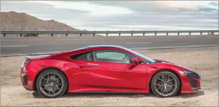  ??  ?? ‘Electrifie­d’ Acura NSX super car boasts giddy performanc­e but comes with a $189,500 price tag.