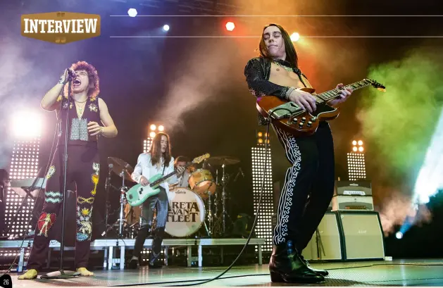  ??  ?? Above
Jake Kiszka takes centre stage: “I’m all about stretching the possibilit­ies,” he says.