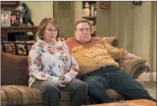  ?? ADAM ROSE — ABC VIA AP ?? In this image released by ABC, Roseanne Barr, left, and John Goodman appear in a scene from the reboot of “Roseanne,” premiering on Tuesday at 8 p.m. EST.