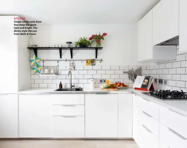  ??  ?? KITCHENSim­ple white units from Ikea keep the space light and bright. The Metro-style tiles are from Walls &amp; Floors