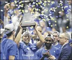  ?? WADE PAYNE / AP ?? Kentucky is the rare SEC school where basketball, and not football, is the traditiona­l sport of choice. The Wildcats advanced to the Sweet 16.