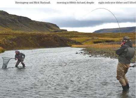  ??  ?? Guide Sibbi nets the author’s 7lb sea trout from pool 35 of the Laxá í Kjos