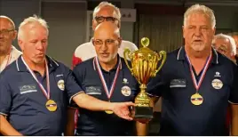  ?? (Photo DR) ?? Serge Balligand, Achour Fherat et le président-joueur Dany Fontaine sont devenus champions de France de 4e division en battant l’équipe de Bourges.