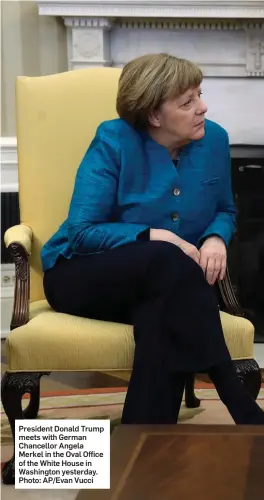  ??  ?? President Donald Trump meets with German Chancellor Angela Merkel in the Oval Office of the White House in Washington yesterday. Photo: AP/Evan Vucci