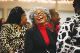  ?? Associated Press photo ?? Joyce Holloway laughs during a sermon during a 16th Street Baptist church service Sunday in Birmingham, Ala. At the church, pastor Arthur Price told the mostly black congregati­on that Alabama's U.S. Senate election is too important to skip. “There’s...