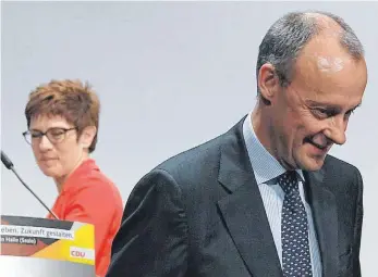  ?? FOTO: DPA ?? Bislang galt Annegret Kramp-Karrenbaue­r als Favoritin auf den CDU-Vorsitz. Jetzt lässt ihr Konkurrent Friedrich Merz aufhorchen.