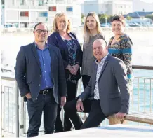  ??  ?? The team at MTF Finance South Dunedin, (from left) Chris Moore, Sue Jocelyn, Latisha Mellon, Tony Gow, and Denise Ross.