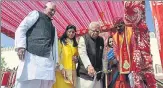  ?? HTPHOTO ?? Governor Ram Naik lighting a lamp at an event in Kanpur on ▪
Monday.