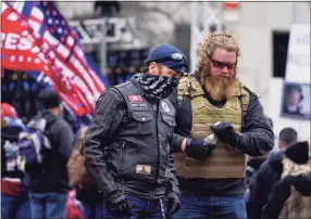  ?? Jacquelyn Martin / Associated Press ?? People attend a rally at Freedom Plaza on Tuesday in Washington in support of President Donald Trump.