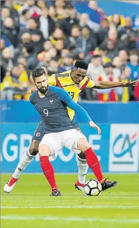  ?? FOTO: GETTY IMAGES ?? Yerry Mina, aquí con Olivier Giroud, firmó una buena actuación en Saint Denis