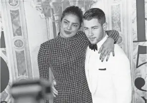  ?? GETTY IMAGES ?? Newly engaged Priyanka Chopra and Nick Jonas drew cheers at the Ralph Lauren 50th anniversar­y event Friday night.