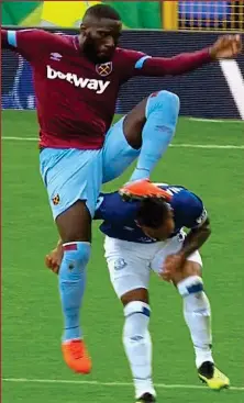  ??  ?? High kick: Masuaku connects with Walcott’s neck