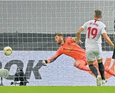  ??  ?? Luuk de Jong beats David De Gea for Sevilla’s winner.