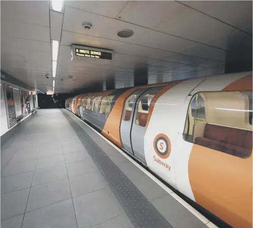  ?? Picture: John Devlin ?? Passengers will be able to make calls as their trains go round the Glasgow Subway for the first time