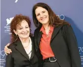  ?? VIANNEY LE CAER/INVISION ?? Nan Goldin, left, and director Laura Poitras are seen Sept. 3 at the Venice film festival in Italy.