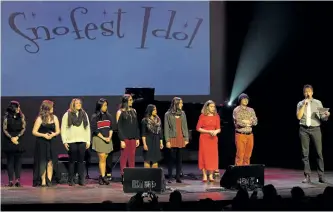  ?? JESSICA NYZNIK/EXAMINER ?? All nine 2017/18 Snofest Idol finalists take the stage with emcee Ray Henderson during Snofest Idol at Showplace Performanc­e Centre on Sunday. Amy Sarginson won.