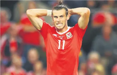  ?? Picture: Getty Images ?? BODY BLOW. Wales are going to be without star striker Gareth Bale for their friendly clash with Spain tonight.