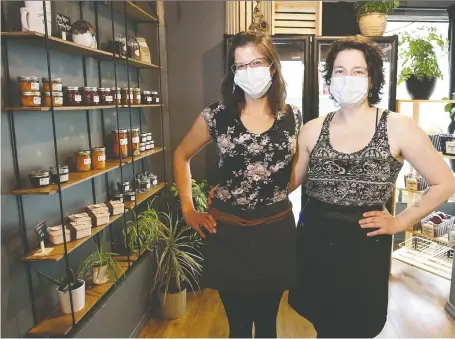  ?? MICHELLE BERG ?? Living Sky Cafe co-owners Jenna Dube and Taylor Morrison have added a mini-grocery store and market to their space to meet the demand from their customers who live downtown. Offerings will include bread baked on-site.