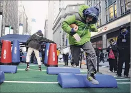  ?? Maddie Meyer / Getty Images ?? While in the past kids could directly participat­e in the Kids Play 60 initiative, this year more than 100,000 will participat­e virtually.