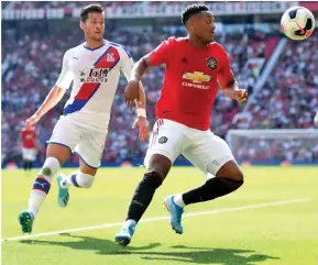  ?? Photo: Evening Standard ?? Manchester United’s Anthony Martial (right) in action against Crystal Palace’s Joel Ward in their English Premier League match at Old Trafford in Manchester, England on on August 25, 2019.