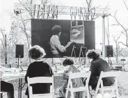  ??  ?? Fans of Bob Ross try their hands at re- creating “Sunset Aglow” from a 1993 episode of “The Joy of Painting.”