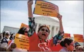  ?? Shawn Thew EPA / Shuttersto­ck ?? ACTIVISTS PROTEST at the Supreme Court on Tuesday as justices hear a case on the 2020 census.