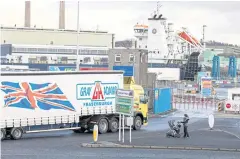  ?? AFP ?? A lorry arrives at Larne port in Antrim, where a customs post has been establishe­d as part of the Northern Ireland Protocol, on Nov 29 last year.