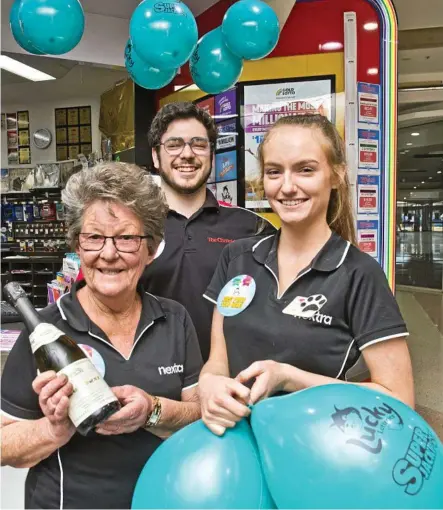  ?? Photo: Nev Madsen ?? WHAT A WIN: Wilsonton Newsagency’s Christine Grace (left), Hayden Wheeler and Ellie Adams are celebratin­g after the shop sold a $2.32 million winning lottery ticket.