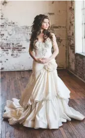  ?? ART/PHOTOGRAPH­Y BY SYDNEY RASCH ?? Getting an elegant dress properly altered will enhance the overall beauty of the dress and add confidence for the bride.