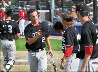  ?? AUSTIN HERTZOG - DIGITAL FIRST MEDIA ?? Boyertown’s Mitch Pinder (24) is congratula­ted by Tyler Kreitz after the Bears’ three-run fourth inning against Cumberland Valley in the PIAA Class AAAA semifinals Monday. Pinder had an RBI single in the frame.