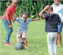  ??  ?? A game of football was all these little boys needed to have a great time at Fancy Frenz Christmas treat.